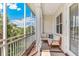 Spacious screened porch with outdoor furniture, offering a relaxing retreat at 10300 Coral Landings Ct # 91, Placida, FL 33946