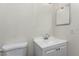 Simple bathroom with a vanity and toilet at 18380 Ohara Dr, Port Charlotte, FL 33948