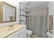 Bathroom with updated vanity and shower at 25100 Sandhill Blvd # B-103, Punta Gorda, FL 33983