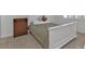 Bedroom with white bed frame and dresser at 25100 Sandhill Blvd # B-103, Punta Gorda, FL 33983