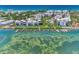 Aerial view of condo community with boat docks at 2950 N Beach Rd # A315, Englewood, FL 34223