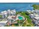 Aerial view of waterfront community with pool and lush landscaping at 2950 N Beach Rd # A315, Englewood, FL 34223