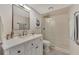 Clean bathroom with a walk-in shower and modern vanity at 2950 N Beach Rd # A315, Englewood, FL 34223