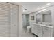 Updated bathroom with a walk-in shower and modern vanity at 2950 N Beach Rd # A315, Englewood, FL 34223