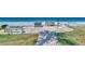 Convenient beach access with seating and grilling area at 2950 N Beach Rd # A315, Englewood, FL 34223