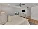 Spacious bedroom with king-size bed and en-suite bathroom access at 2950 N Beach Rd # A315, Englewood, FL 34223