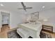 Bright bedroom with a king-size bed and an ensuite bathroom at 2950 N Beach Rd # A315, Englewood, FL 34223