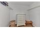 Large closet with shelving and a dresser for storage at 2950 N Beach Rd # A315, Englewood, FL 34223