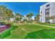 Landscaped grounds with lush green lawns and tropical foliage at 2950 N Beach Rd # A315, Englewood, FL 34223