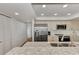 Modern kitchen with stainless steel appliances and granite countertops at 2950 N Beach Rd # A315, Englewood, FL 34223