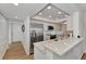 Modern kitchen with stainless steel appliances and granite countertops at 2950 N Beach Rd # A315, Englewood, FL 34223