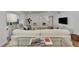 Bright living room with comfortable seating and hardwood floors at 2950 N Beach Rd # A315, Englewood, FL 34223