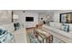 Relaxing living room with comfortable sofas and a stylish coffee table at 2950 N Beach Rd # A315, Englewood, FL 34223