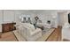 Spacious living room with light and airy decor and hardwood floors at 2950 N Beach Rd # A315, Englewood, FL 34223
