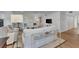 Bright living room boasts comfy sofas, wood-look floors, and stylish decor at 2950 N Beach Rd # A315, Englewood, FL 34223