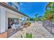 Relaxing pool area with patio furniture and lush landscaping at 2950 N Beach Rd # A315, Englewood, FL 34223