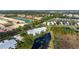 Condo building near pond and lush landscape at 412 Sunset Lake Blvd # 206, Venice, FL 34292