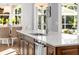 Modern kitchen island with quartz countertop and double sink at 421 Baynard Dr, Venice, FL 34285