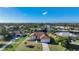 Beautiful home with tile roof, lush landscaping, and canal access at 4658 Arlington Dr, Placida, FL 33946