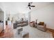 Spacious, open living room with large windows, comfortable seating, and decorative accents at 4658 Arlington Dr, Placida, FL 33946