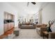 Inviting living room with plush furniture, warm tones, and access to other living spaces at 4658 Arlington Dr, Placida, FL 33946