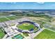 Aerial view of a baseball stadium with surrounding landscape at 5015 Seagrass Dr, Venice, FL 34293