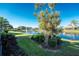 Backyard oasis with lake view at 5015 Seagrass Dr, Venice, FL 34293