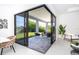 Private patio with grey pavers and comfortable seating at 6192 Kambach St, Port Charlotte, FL 33981