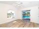 Empty bedroom with sliding glass doors leading to a pool at 646 Boundary Blvd, Rotonda West, FL 33947