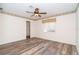 Spacious, unfurnished bedroom with walk-in closet and ceiling fan at 646 Boundary Blvd, Rotonda West, FL 33947