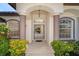 Open foyer with arched doorways and views into the interior living space at 646 Boundary Blvd, Rotonda West, FL 33947