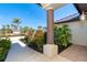 Front porch with a view of the landscaped yard and neighboring properties at 646 Boundary Blvd, Rotonda West, FL 33947