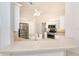 Kitchen with stainless steel appliances, white cabinets, and an island at 646 Boundary Blvd, Rotonda West, FL 33947