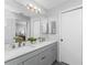 Modern bathroom featuring a double vanity, updated fixtures, and ample counter space at 691 Linden Dr, Englewood, FL 34223