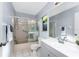 Clean bathroom with tub, shower, and vanity at 691 Linden Dr, Englewood, FL 34223