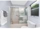 Bathroom with tub/shower combo and updated vanity at 691 Linden Dr, Englewood, FL 34223