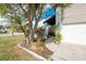 Landscaped walkway leading to the house entrance at 691 Linden Dr, Englewood, FL 34223