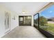 Spacious screened porch with tile flooring at 691 Linden Dr, Englewood, FL 34223