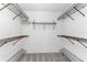 Spacious walk-in closet with built-in wire shelving at 691 Linden Dr, Englewood, FL 34223