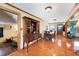 Bright dining room with hardwood floors and built-in hutch at 780 Orchard Ln, Englewood, FL 34223