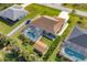 Aerial view of house, pool, shed, and backyard at 9266 Carnation Ave, Englewood, FL 34224