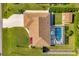 Aerial view showing house, pool, and backyard at 9266 Carnation Ave, Englewood, FL 34224