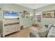 Cozy Gathering room with comfortable seating and a large-screen TV at 9266 Carnation Ave, Englewood, FL 34224