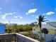 Aerial view of waterfront property showing beach access and surrounding houses at 9526 Jolly Roger Trl, Placida, FL 33946