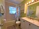 Clean bathroom with a shower/tub combo and updated vanity at 9526 Jolly Roger Trl, Placida, FL 33946