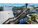 Stairway leads to rooftop deck, providing panoramic views in this elevated beach home at 9526 Jolly Roger Trl, Placida, FL 33946