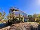 Elevated home with wrap-around decks, offering scenic views at 9526 Jolly Roger Trl, Placida, FL 33946