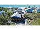 Charming beachfront homes offer scenic views and feature colorful exteriors at 9526 Jolly Roger Trl, Placida, FL 33946