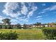 Waterfront view of condo community from across the lawn at 524 Pine Hollow Cir # 524, Englewood, FL 34223