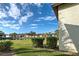 View of condo community with pond and lush greenery at 524 Pine Hollow Cir # 524, Englewood, FL 34223